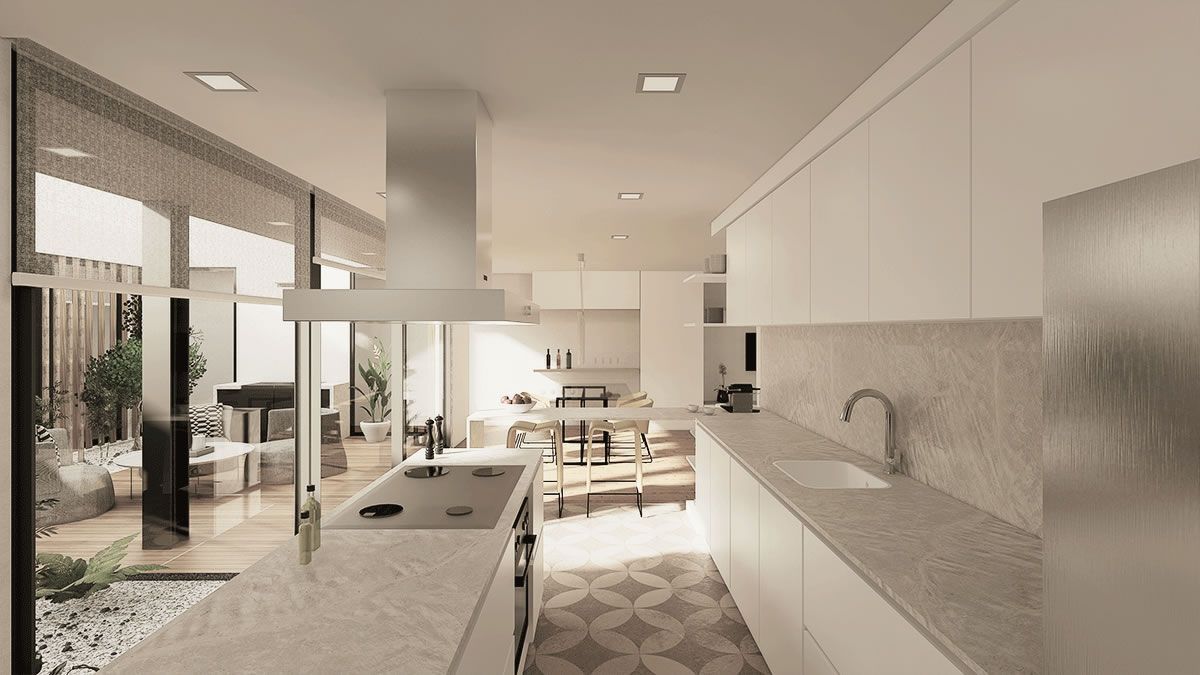 E20 Studio - Arquitectos Palma de Mallorca - Diseño de cocina abierta con al patio con isla de encimera de piedra natural